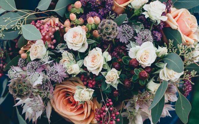 A bouquet of roses and complementary flowers